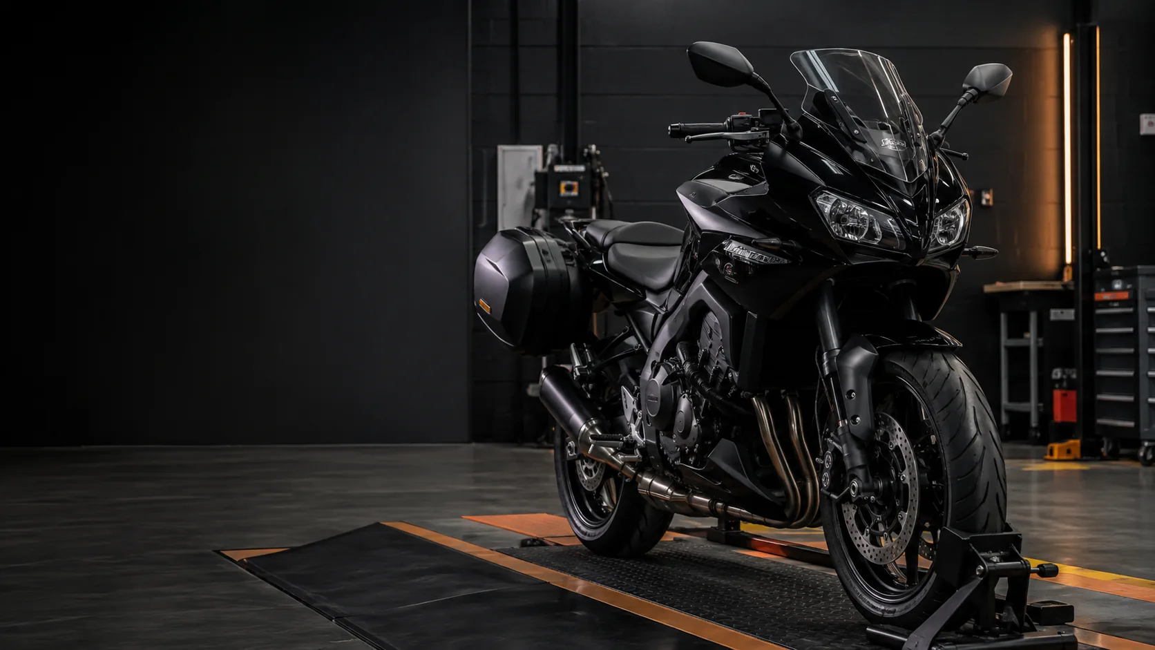 Motorcycle positioned for an MOT inspection in a professional workshop